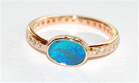 Blue green opal with paved band ring